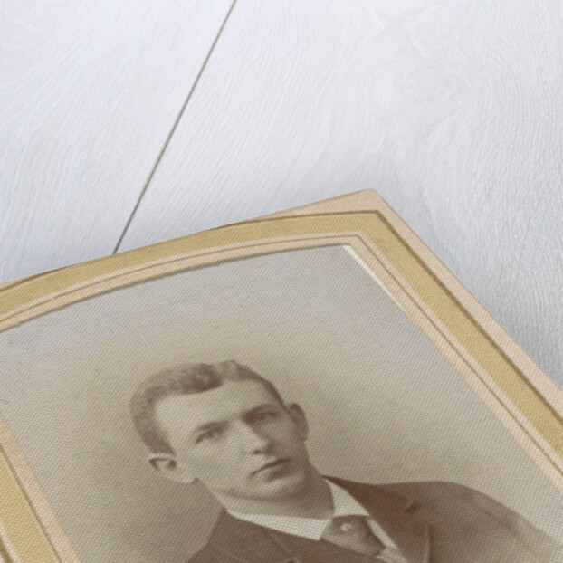 Portrait of a man wearing a coat and tie by J.C. Reesinck