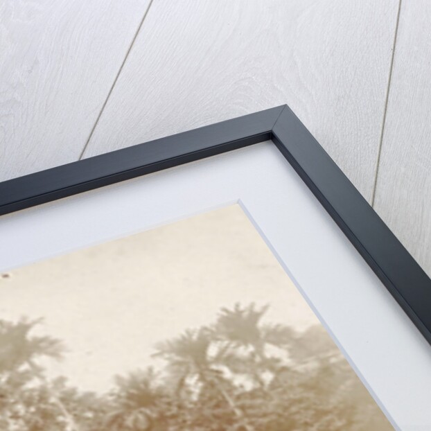 Man and woman posing for a house with a garden in Ambon, Indonesia by Anonymous