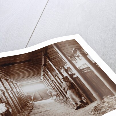 Interior of a stable with two servants by Anonymous