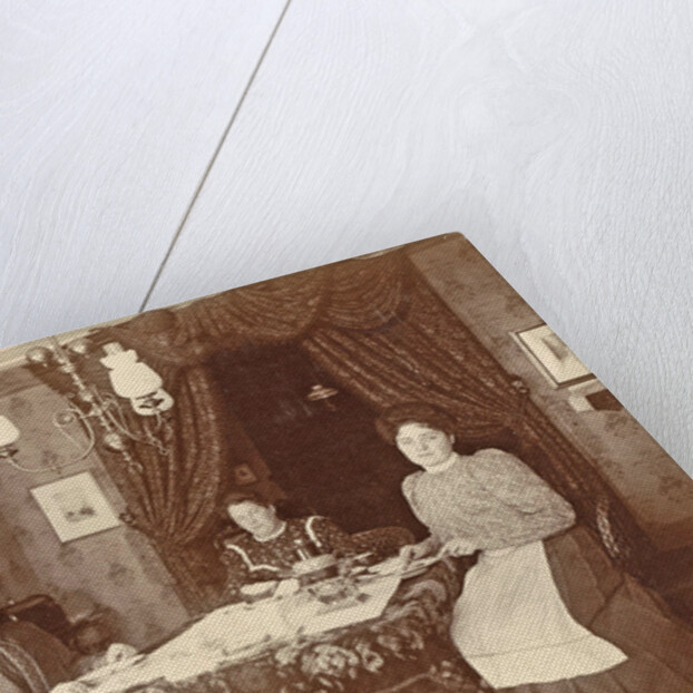 Three women sitting at table at meal by Anonymous