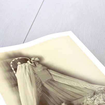 baby in a crib with a sky by Anonymous