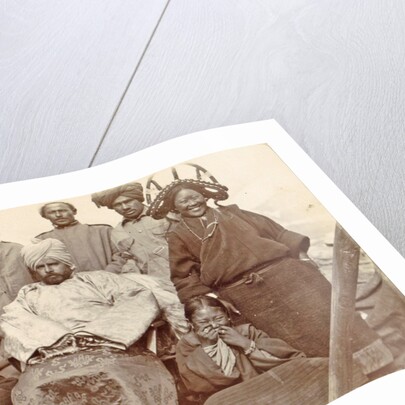 Army Intendant with some women, children and men in Tibet by D.T. Dalton