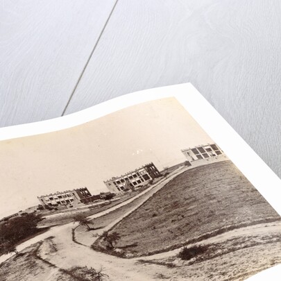 Four buildings along a road in Persia, probably telegraph offices by Antoine Sevruguin