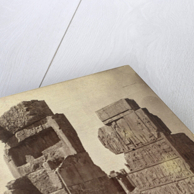 Three men posing with a relief of King Darius at Persepolis by Antoine Sevruguin