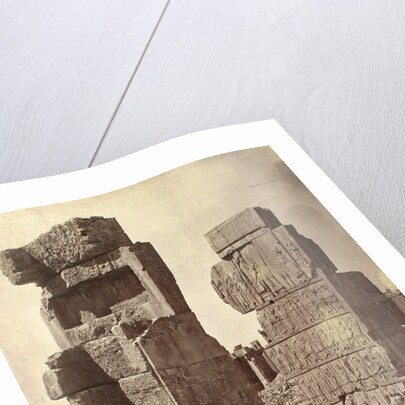 Three men posing with a relief of King Darius at Persepolis by Antoine Sevruguin