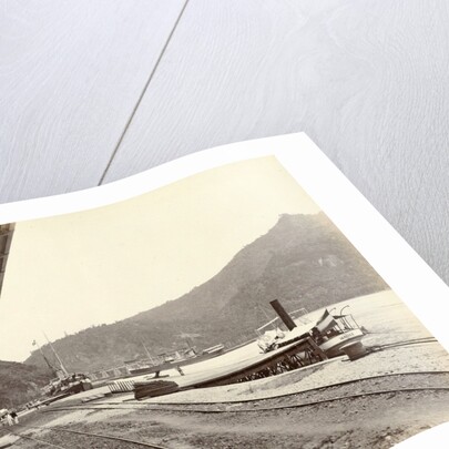 Quay with railway tracks and boats in the Emmahaven Padang by Anonymous