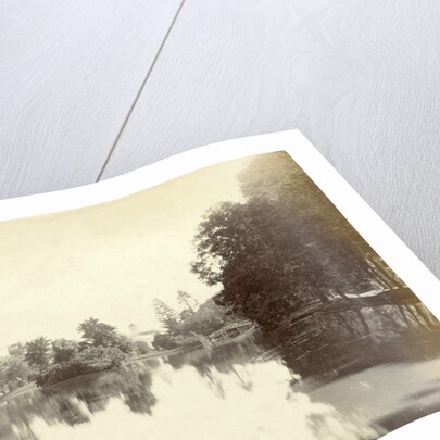 Water in the Dutch East Indies at the end with a bridge and a church tower by Anonymous