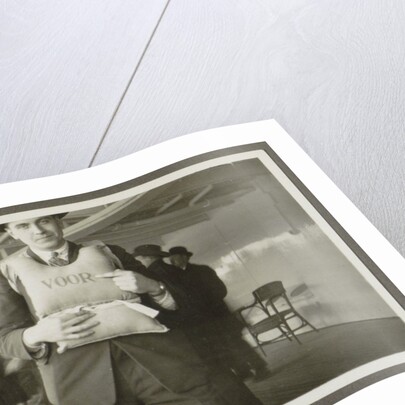 Two men wearing life jackets on board a ship by Anonymous