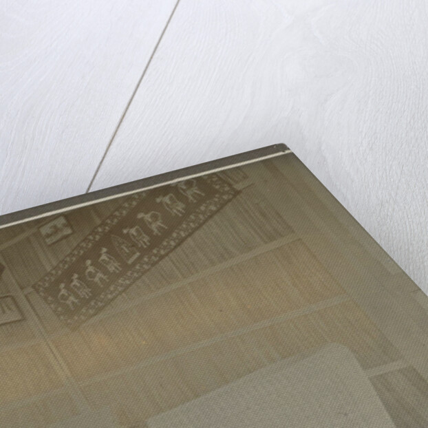 Man sitting at a table by Anonymous