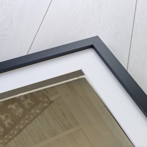 Man sitting at a table by Anonymous