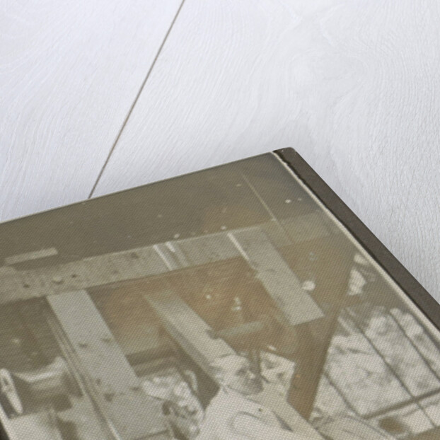 Man operating a machine with a lever by Anonymous