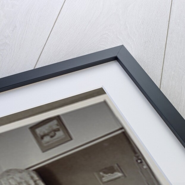 Three men and a woman around a table by Anonymous