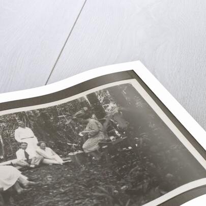 Group of men and women in a forest by Anonymous