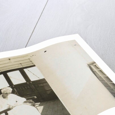 aboard boat to Java, Indonesia, seated woman by Anonymous