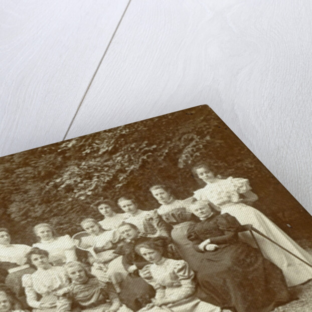 Group portrait of girls and teachers, with tennis and cricket stick by Blitz en Zn