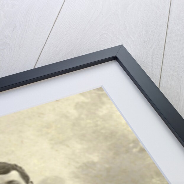 Studio Portrait of a young man standing by Jacobus Vetter