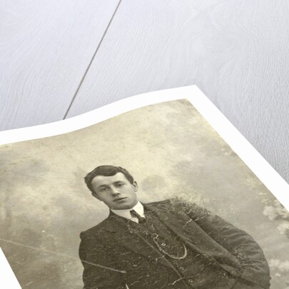 Studio Portrait of a young man standing by Jacobus Vetter