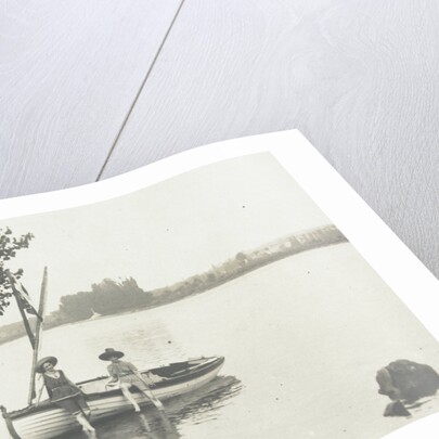 Children with a rowing boat on the bank of a river or lake by Anonymous