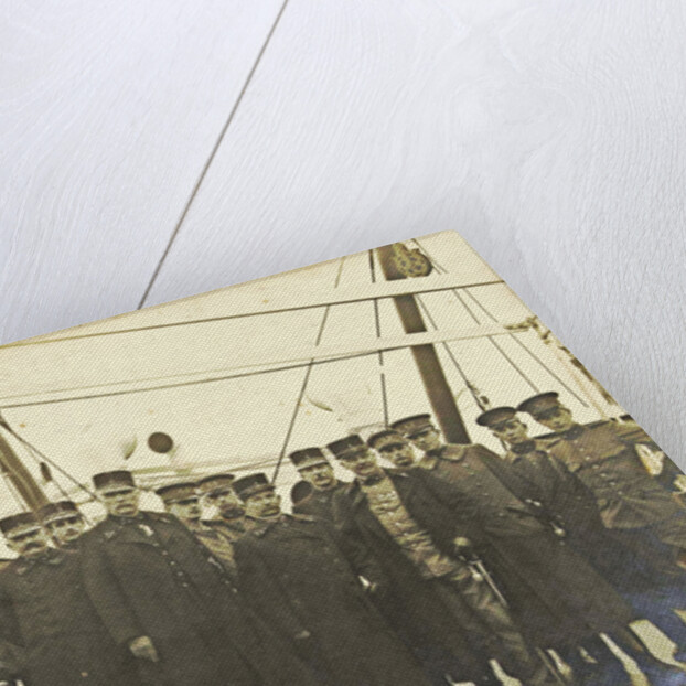 Group portrait of crew on deck of a ship by Anonymous