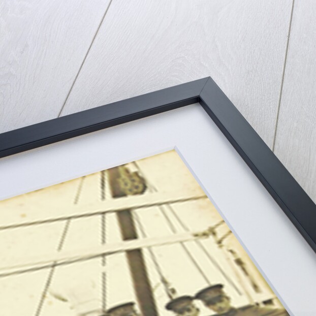 Group portrait of crew on deck of a ship by Anonymous