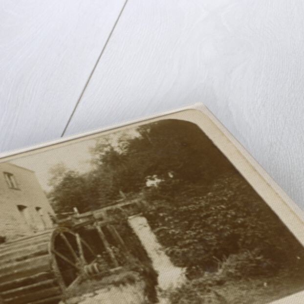 Waterwheel in a stream by Anonymous