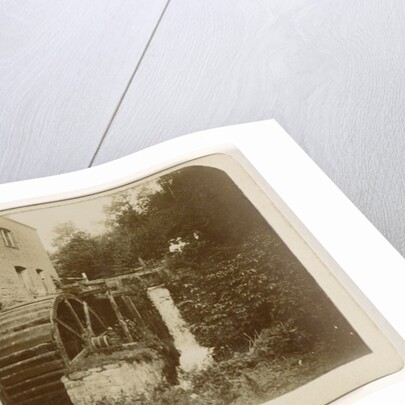 Waterwheel in a stream by Anonymous