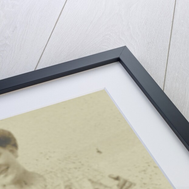Portrait of a young couple in the outdoors; encased in matted cardboard by Anonymous