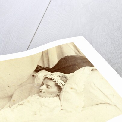 Post mortem portrait of a deceased woman; she is wearing a hat and holding a bunch of roses and a rosary between her clasped hands by Anonymous