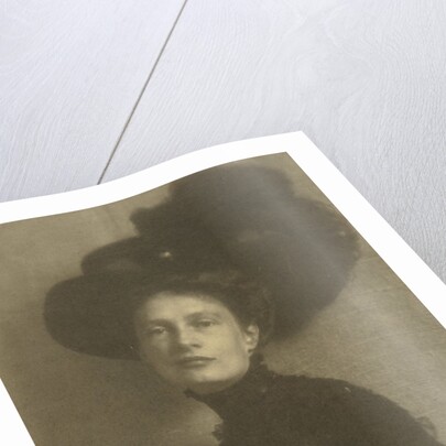 Portrait of a woman with feather hat by Heinrich Kühn