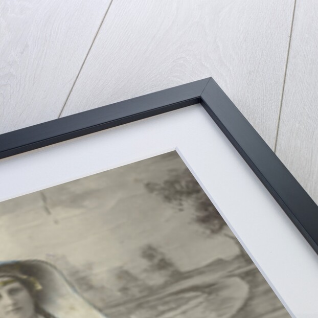 Portrait of a woman in Zaanse costume posing for a background cloth by S. Bakker Jz.