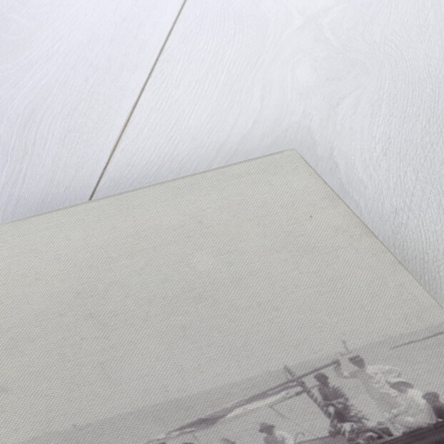 Group men in a boat on the beach in the Dutch East Indies, indonesia by Anonymous