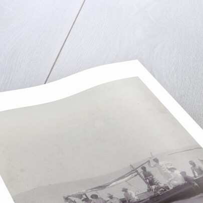 Group men in a boat on the beach in the Dutch East Indies, indonesia by Anonymous