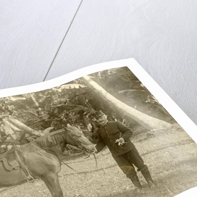 Portrait of a soldier with horse in the Dutch East Indies, Indonesia by Anonymous