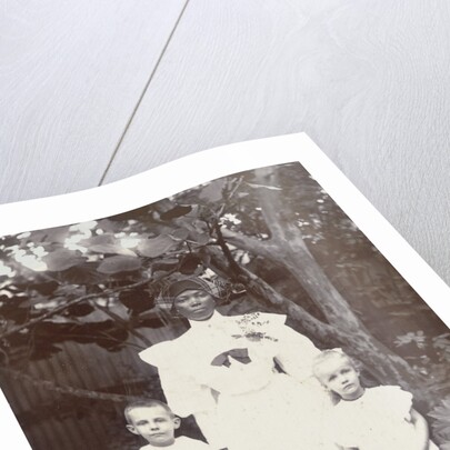 Portrait of Surinamese nanny with two white children by Augusta Curiel