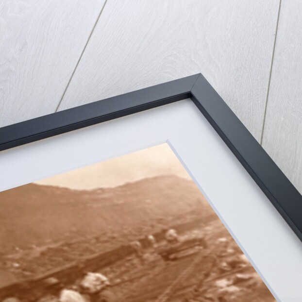 Spanish laborers at work in Culebra Cut and loaded train hauling dirt from canal, USA by Anonymous