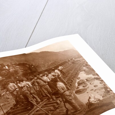 Spanish laborers at work in Culebra Cut and loaded train hauling dirt from canal, USA by Anonymous
