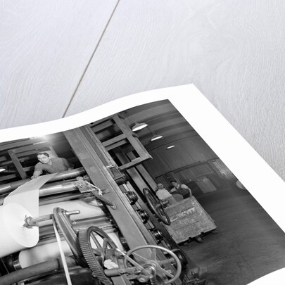 Mt. Holyoke, Massachusetts - Paper. American Writing Paper Co. Super-calender - putting on roll, starting operation, 1936 by Lewis Hine