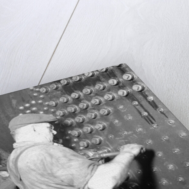 Eddystone, Pennsylvania - Railroad parts. Boilermaker and helper working on locomotive boiler, 1936 by Lewis Hine