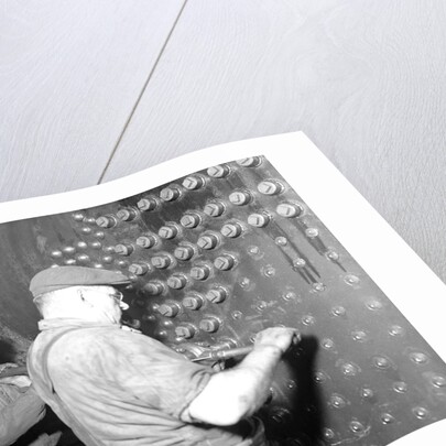 Eddystone, Pennsylvania - Railroad parts. Boilermaker and helper working on locomotive boiler, 1936 by Lewis Hine