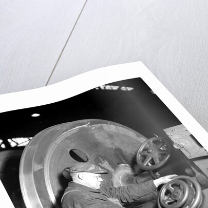 Eddystone, Pennsylvania - Railroad parts. Machinist machining wheel to fit driving pin on above wheels on newest type of locomotive, March 1937 by Lewis Hine