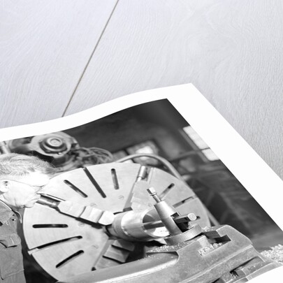 Eddystone, Pennsylvania - Railroad parts. Tool-builder planing for a taper shoe on a steam hammer ram, March 1937 by Lewis Hine