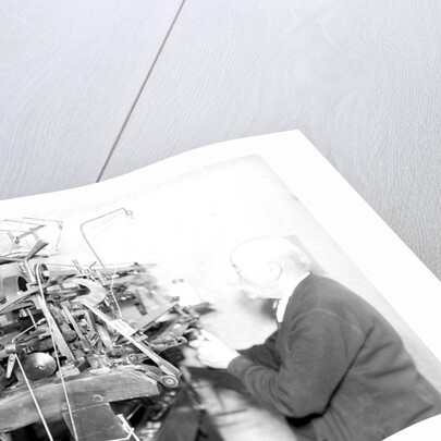 Philadelphia, Pennsylvania - Hosiery. Minnesac Mills. Man working at machine., May 1937 by Lewis Hine