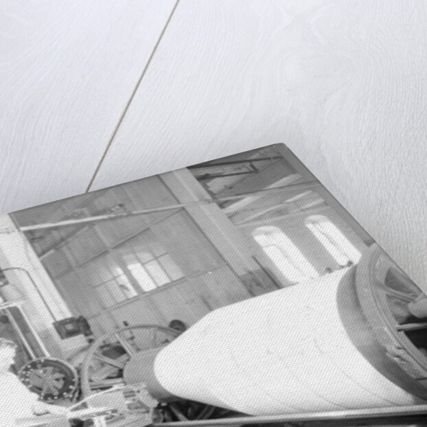 Paterson, New Jersey - Textiles. Jackson Winding and Warping Company - Picture of a high speed warper, June 1937 by Lewis Hine