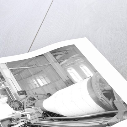 Paterson, New Jersey - Textiles. Jackson Winding and Warping Company - Picture of a high speed warper, June 1937 by Lewis Hine