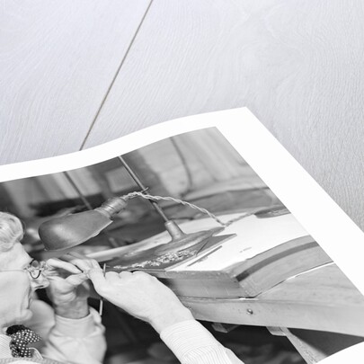 Lancaster, Pennsylvania - Hamilton Watch. Operation - inspecting plate by Lewis Hine