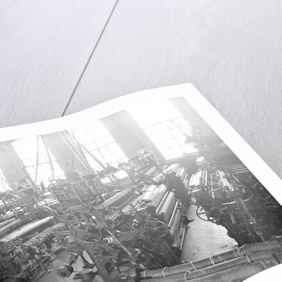 Paterson, New Jersey - Textiles. Idle looms in a cockroach shop. Note the empty beams in the foreground, March 1937 by Lewis Hine