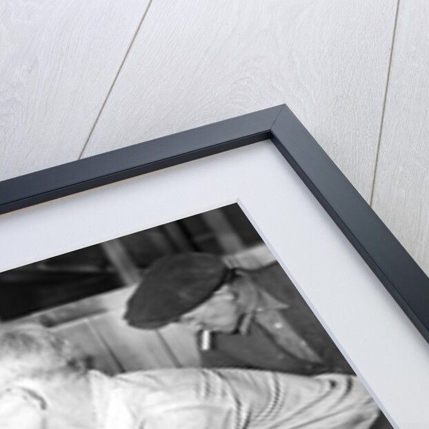 Millville, New Jersey - Glass bottles. Man working at ovens, 1936 by Lewis Hine