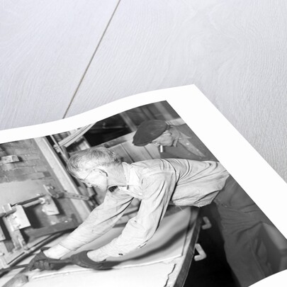 Millville, New Jersey - Glass bottles. Man working at ovens, 1936 by Lewis Hine