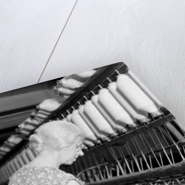 Millville, New Jersey - Textiles. Millville Manufacturing Co. Lady twisting thread, 1936 by Lewis Hine