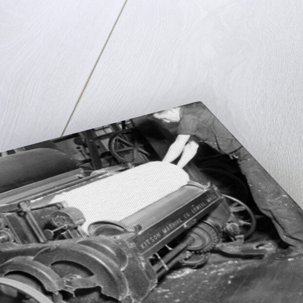 Millville, New Jersey - Textiles. Millville Manufacturing Co. Man rolling fabric, 1936 by Lewis Hine